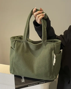 Tilda – Bolso de mano con diseño de cordón