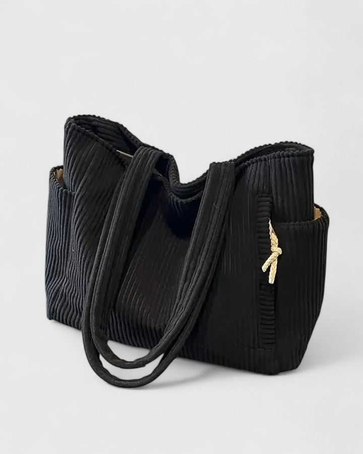 Liorane | Elegante bolsa de canalé con detalles de cuerda