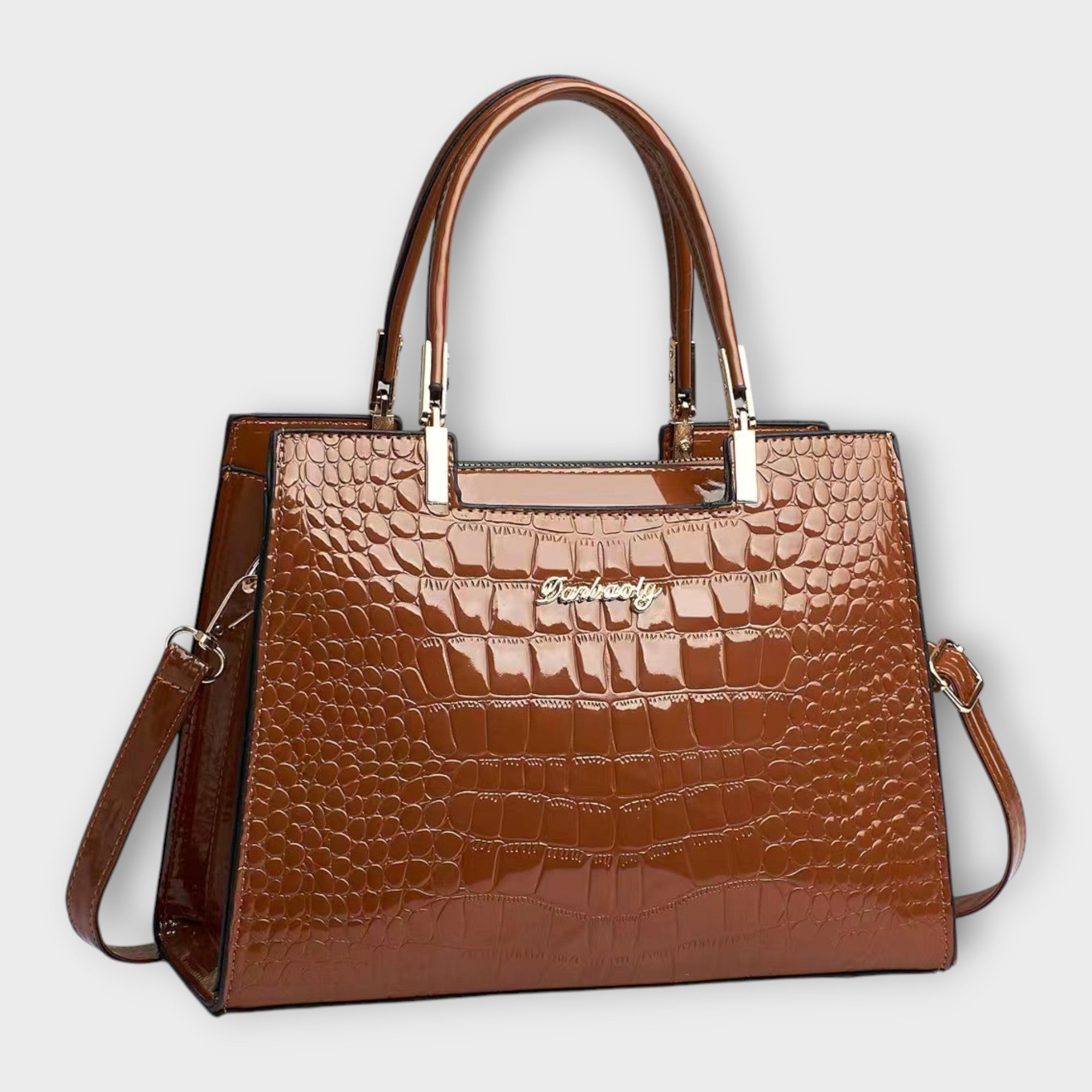 Olivia - Bolso de mano con acabado brillante en estampado de cocodrilo