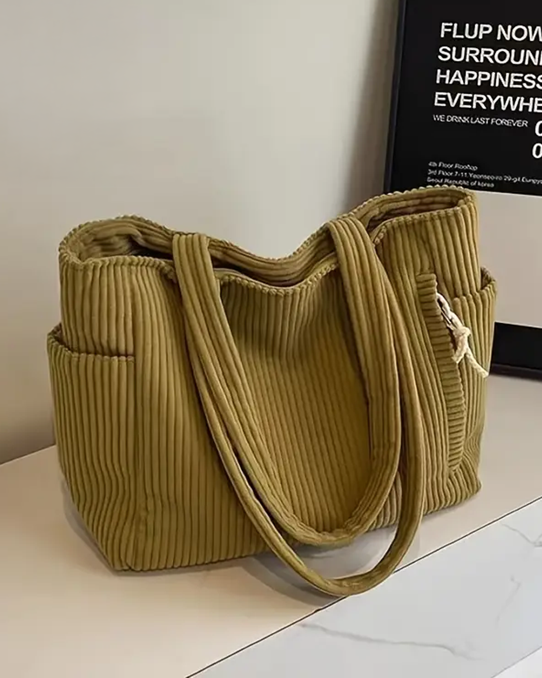 Tilda – Bolso de mano con diseño de cordón