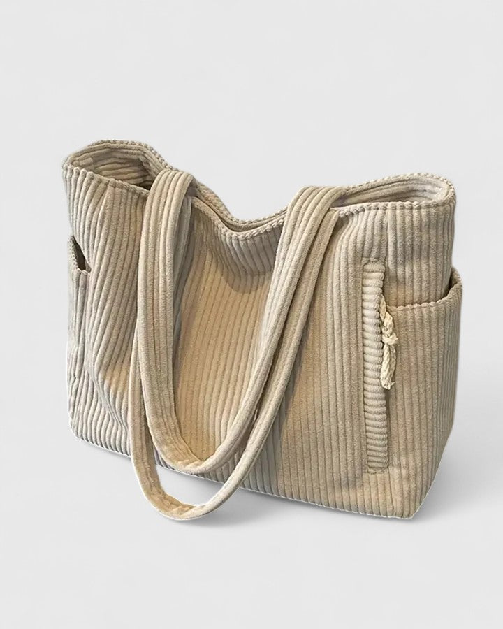 Liorane | Elegante bolsa de canalé con detalles de cuerda