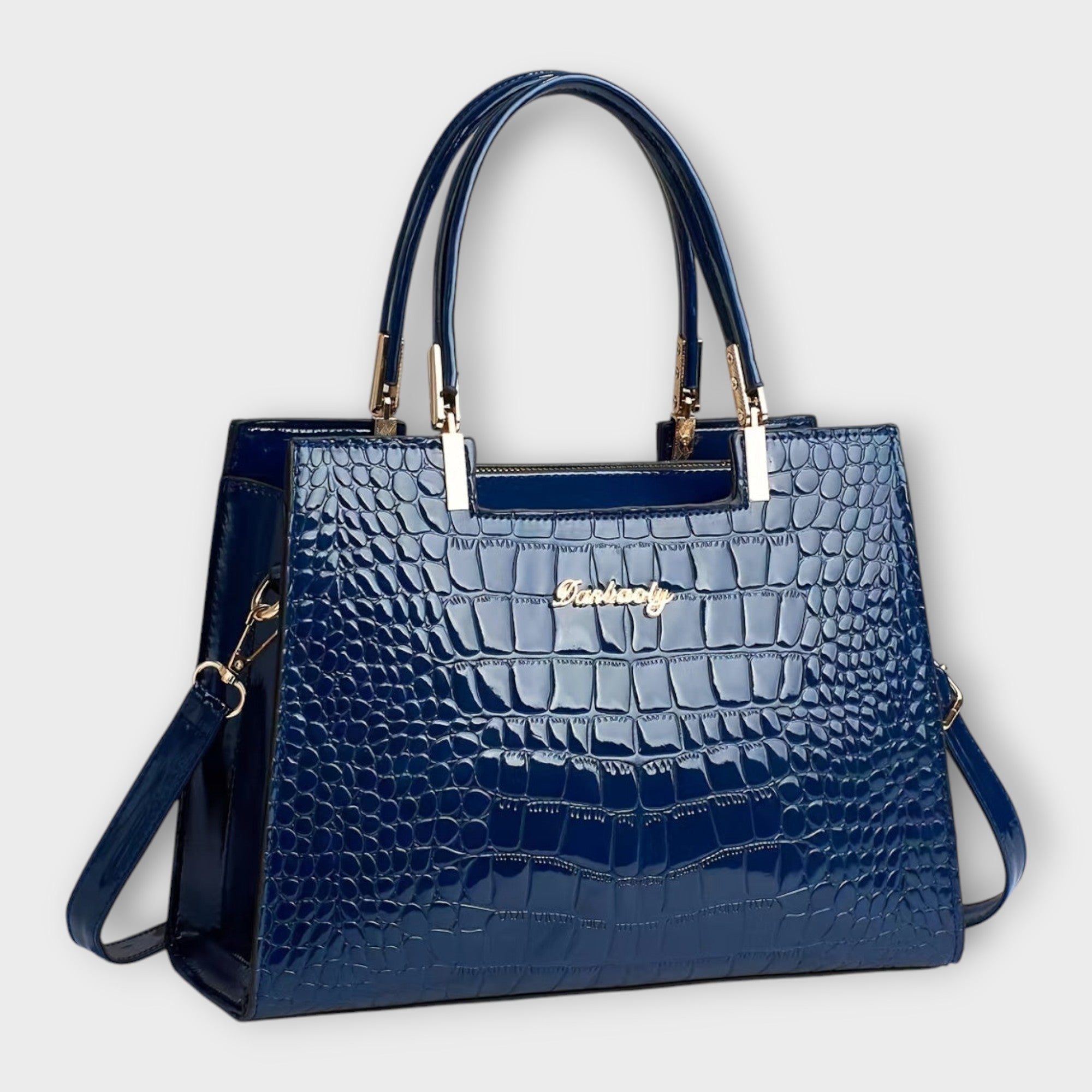 Olivia - Bolso de mano con acabado brillante en estampado de cocodrilo