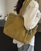Tilda – Bolso de mano con diseño de cordón