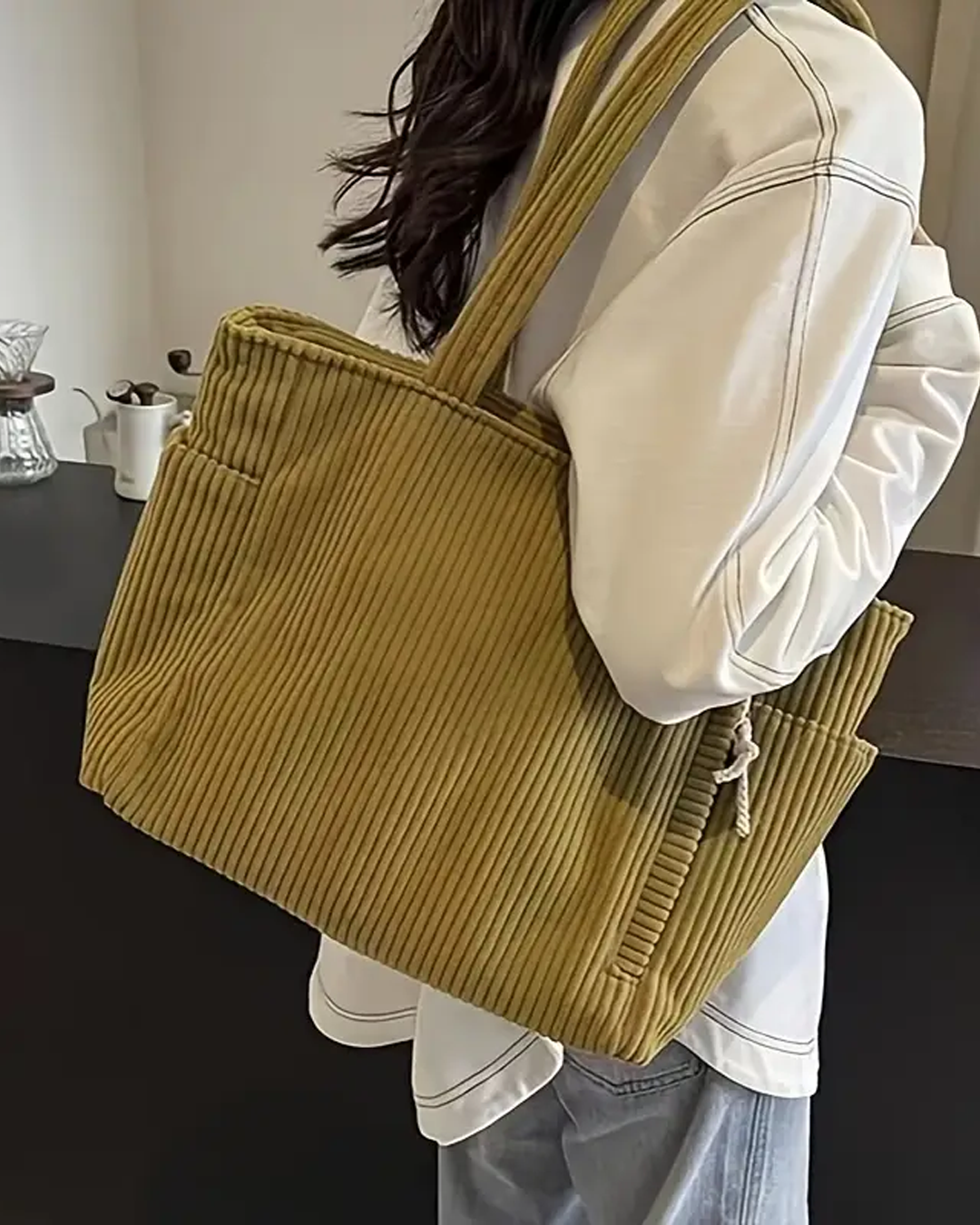 Tilda – Bolso de mano con diseño de cordón