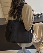 Tilda – Bolso de mano con diseño de cordón